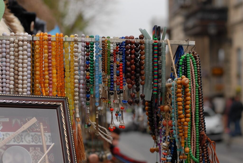 handmade necklaces on a street market